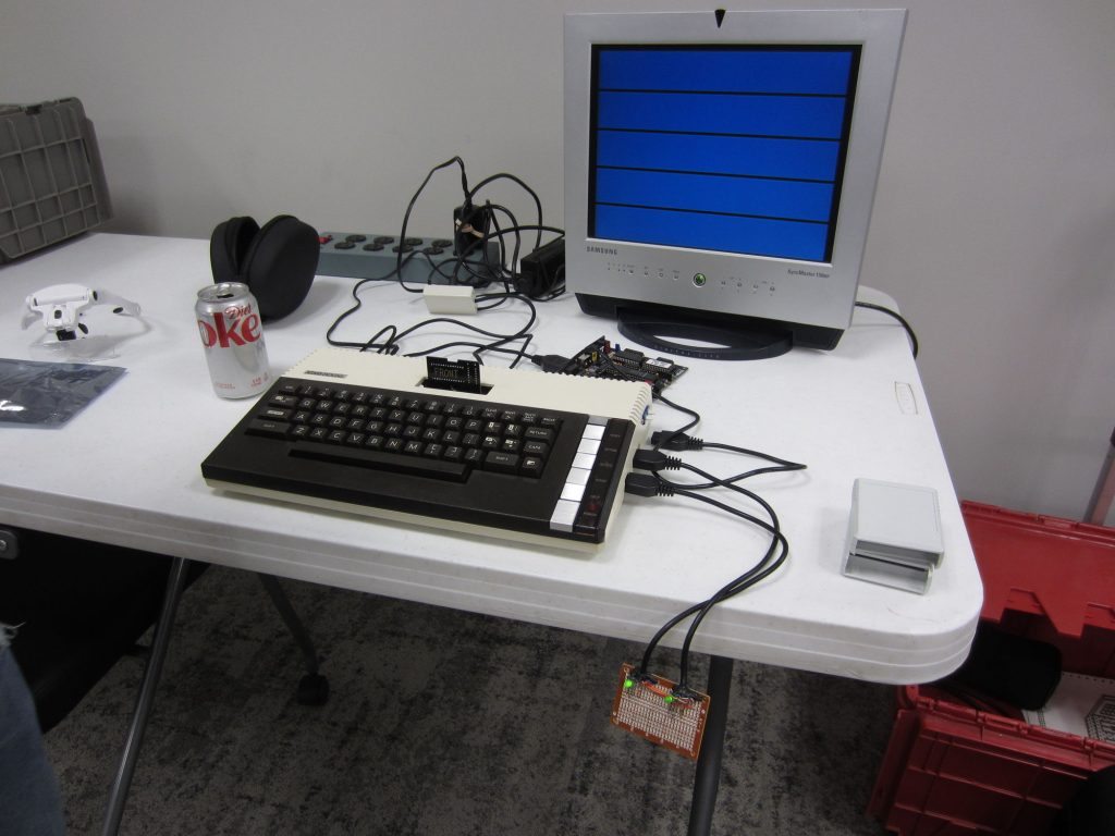 Chris' prototype wiring harness for Atari 800 XL/XE test cartridge. An XEP80-II 80 column video adapter (not connected) can seen in behind the computer.