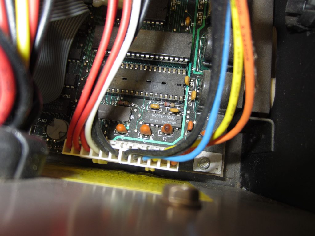 A blown tantalum capacitor in an IBM PC (see video below).